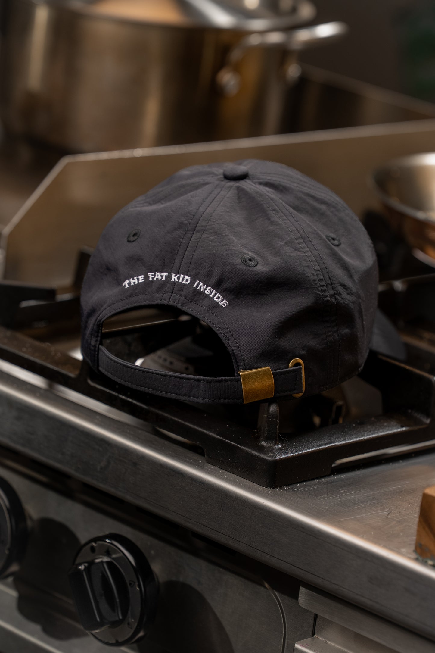The Fat Kid Inside Black Cap